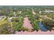 Expansive aerial shot of community with scenic water feature at 5608 Pinnacle Heights Cir # 305, Tampa, FL 33624
