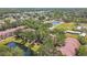 Community with a picturesque pond and sprawling green spaces at 5608 Pinnacle Heights Cir # 305, Tampa, FL 33624