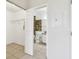 Large closet located off the primary bathroom featuring a white bi-fold door at 5608 Pinnacle Heights Cir # 305, Tampa, FL 33624