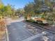 View of 'The Pinnacle' entrance, showcasing lush landscaping and a welcoming atmosphere at 5608 Pinnacle Heights Cir # 305, Tampa, FL 33624