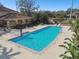 An overhead view of the community pool surrounded by lounge chairs at 5608 Pinnacle Heights Cir # 305, Tampa, FL 33624