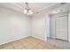Dining room with tiled flooring and views of the entrance hall and closet at 5608 Pinnacle Heights Cir # 305, Tampa, FL 33624