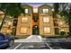 Inviting condo building with well-kept grounds and ample parking at 5608 Pinnacle Heights Cir # 305, Tampa, FL 33624