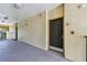 Hallway exterior with door to unit 305 and railings at 5608 Pinnacle Heights Cir # 305, Tampa, FL 33624