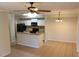 Bright kitchen with an island and dining area at 5608 Pinnacle Heights Cir # 305, Tampa, FL 33624