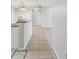 Bright kitchen featuring a breakfast bar and modern lighting at 5608 Pinnacle Heights Cir # 305, Tampa, FL 33624