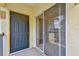 Outdoor patio featuring a sliding glass door and an entrance door at 5608 Pinnacle Heights Cir # 305, Tampa, FL 33624