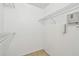 Tiled walk-in closet with wire shelving and electrical fixture at 5608 Pinnacle Heights Cir # 305, Tampa, FL 33624
