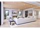 Spacious living room with fireplace and access to balcony at 10126 Gulf Blvd # Ph3, Treasure Island, FL 33706