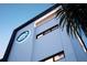 Close-up of building's unique architectural detail and logo at 10126 Gulf Blvd # Ph3, Treasure Island, FL 33706