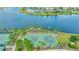 Outdoor basketball court with lake view at 9433 Channing Hill Dr, Sun City Center, FL 33573