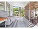 Relaxing screened porch with seating area, overlooking backyard at 6030 62Nd N St, St Petersburg, FL 33709
