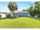 Large backyard with patio, shed, and plenty of green space at 6030 62Nd N St, St Petersburg, FL 33709