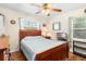 Comfortable bedroom with a wooden bed frame and light blue bedding at 6030 62Nd N St, St Petersburg, FL 33709