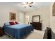 King-size bedroom with dresser and ensuite bathroom access at 19879 Tattnall Way, Brooksville, FL 34601