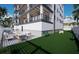 Community patio with seating and dog park at 10126 Gulf Blvd # Ph4, Treasure Island, FL 33706