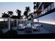 Relaxing patio area with seating and fire pit at 10126 Gulf Blvd # Ph4, Treasure Island, FL 33706