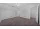 Bedroom with carpet flooring, ceiling fan and closet at 18001 Richmond Place Dr # 122, Tampa, FL 33647