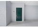 Dark green front door entrance to condo unit with number 122 at 18001 Richmond Place Dr # 122, Tampa, FL 33647