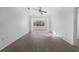 Bright living room with hardwood floors and neutral walls at 18001 Richmond Place Dr # 122, Tampa, FL 33647