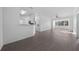 Bright living room with hardwood floors and large windows at 18001 Richmond Place Dr # 122, Tampa, FL 33647