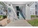 Exterior condo building stairwell leading to upper units at 18001 Richmond Place Dr # 122, Tampa, FL 33647