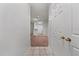 Bright entryway with tile flooring leading to living room at 18001 Richmond Place Dr # 511, Tampa, FL 33647