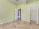 Light and airy bedroom with tile flooring and walk-in closet at 5711 31St E Ct, Ellenton, FL 34222