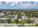 Aerial view highlighting building location near waterfront at 14130 Rosemary Ln # 2208, Largo, FL 33774