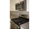 Stainless steel gas range with griddle at 3301 Lila St, Tampa, FL 33610