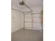 Attached garage with automatic opener and epoxy floor at 3301 Lila St, Tampa, FL 33610