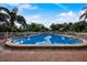 Community pool with plenty of space for swimming and relaxation at 1619 Mission Hills Blvd, Clearwater, FL 33759