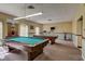 Community game room features billiard tables, ping pong, and exercise equipment at 1619 Mission Hills Blvd, Clearwater, FL 33759