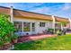 This condo features a spacious patio with seating for outdoor enjoyment at 1619 Mission Hills Blvd, Clearwater, FL 33759