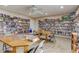 Relax and read in the community library with bookshelves and tables at 1619 Mission Hills Blvd, Clearwater, FL 33759