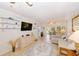 Living room with sectional sofa and access to patio at 1619 Mission Hills Blvd, Clearwater, FL 33759