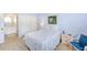 Serene bedroom with light walls and a comfortable bed at 1619 Mission Hills Blvd, Clearwater, FL 33759