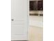 Doorway view into a modern kitchen with granite countertops at 4013 Chadwick Ave, Spring Hill, FL 34609