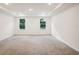 Bright bedroom with neutral carpeting and natural light at 4013 Chadwick Ave, Spring Hill, FL 34609