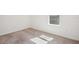 Bright bedroom with neutral carpeting and window at 4013 Chadwick Ave, Spring Hill, FL 34609