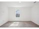 Bright and airy bedroom with carpeted floor and a window offering natural light at 4013 Chadwick Ave, Spring Hill, FL 34609