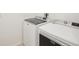 Laundry room with side-by-side washer and dryer at 4013 Chadwick Ave, Spring Hill, FL 34609
