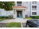 Apartment building entrance with stairs and address numbers at 18001 Richmond Place Dr # 511, Tampa, FL 33647
