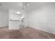 Open living room featuring neutral wall colors and carpet at 18001 Richmond Place Dr # 511, Tampa, FL 33647