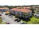 Aerial view of an apartment complex with parking and landscaping at 18001 Richmond Place Dr # 511, Tampa, FL 33647