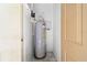 Utility closet with water heater at 18001 Richmond Place Dr # 511, Tampa, FL 33647