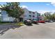 Two-story apartment building with parking and landscaping at 18001 Richmond Place Dr # 511, Tampa, FL 33647