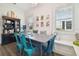 Breakfast nook with built-in bench seating and a dark wood table at 17318 Hanna Rd, Lutz, FL 33549