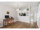 Dining area with kitchen passthrough and hardwood floors at 2316 Lake Woodberry Cir, Brandon, FL 33510