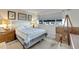 Cozy bedroom with a comfortable bed and ample closet space at 5286 81St N St # 4, St Petersburg, FL 33709